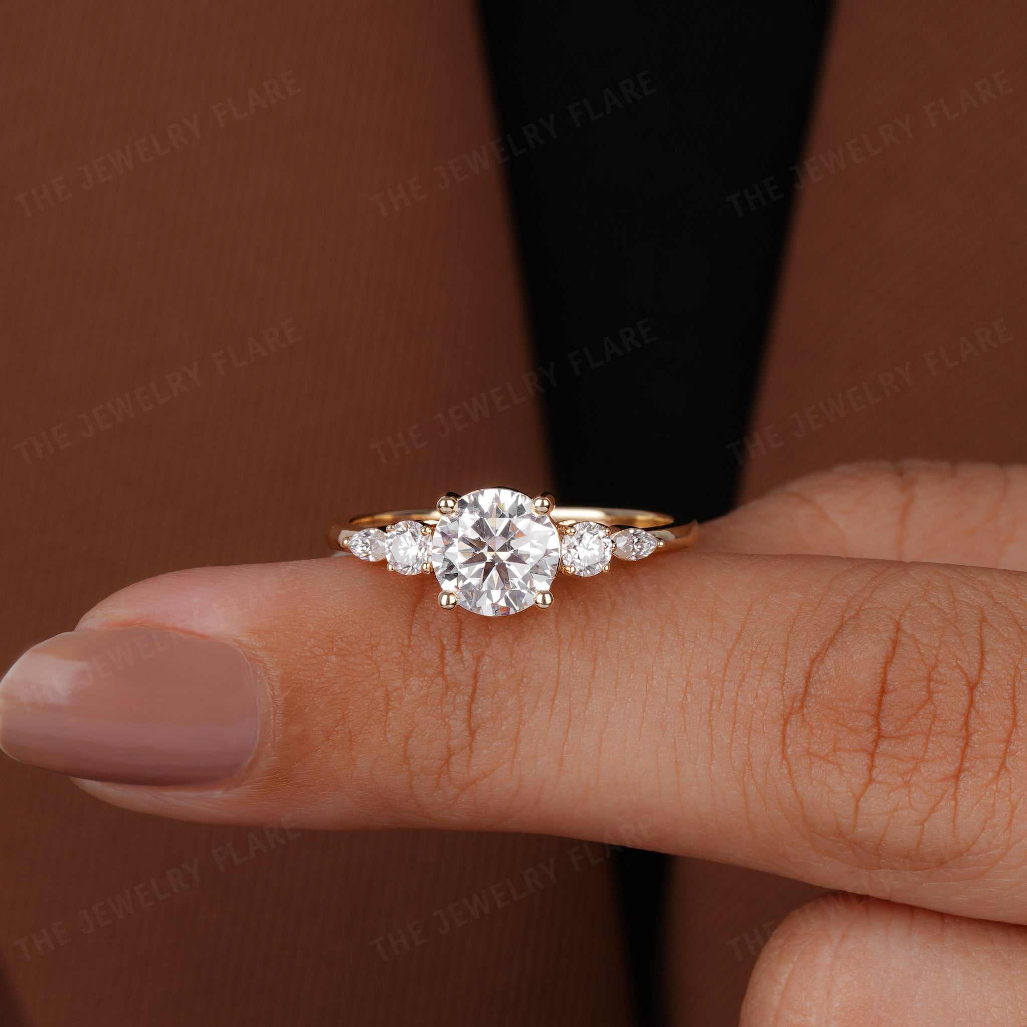 Round Solitaire Ring With Side Marquise Accent