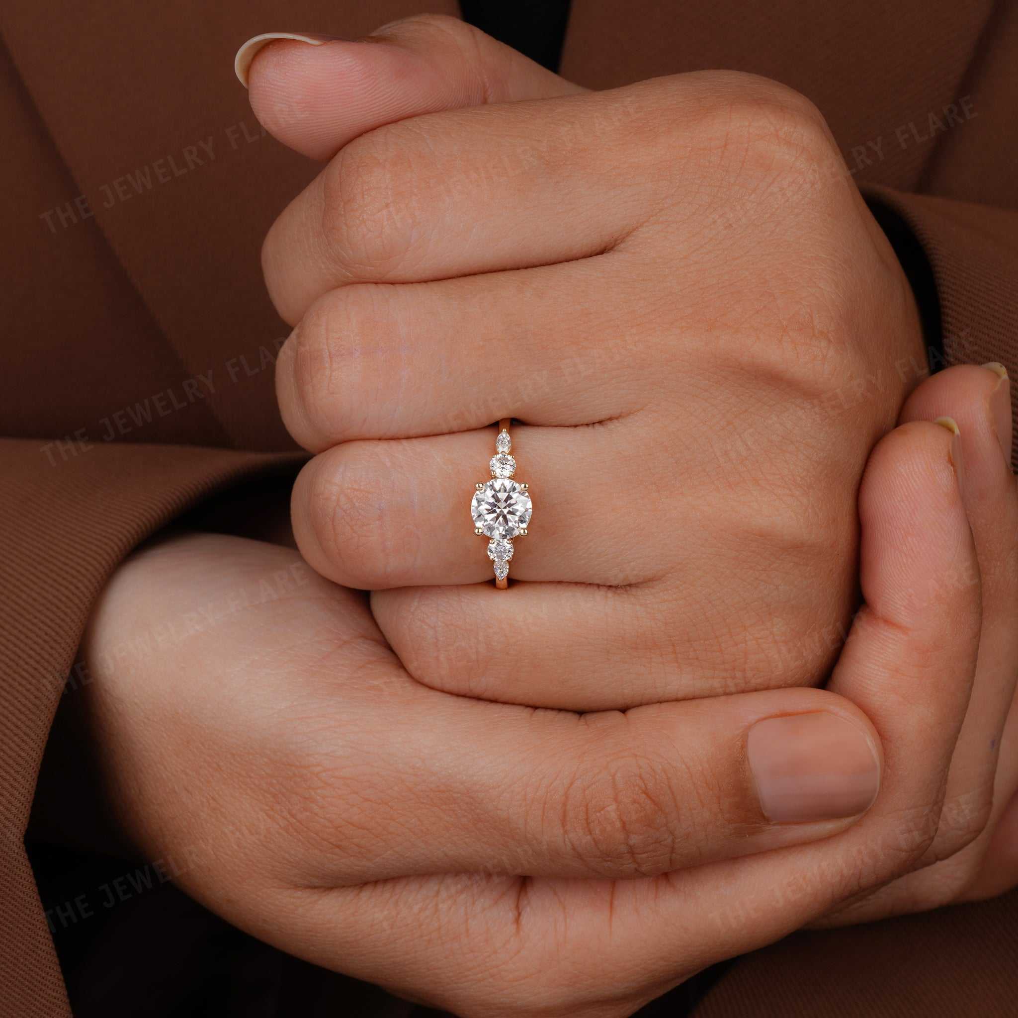 Round Solitaire Ring With Side Marquise Accent