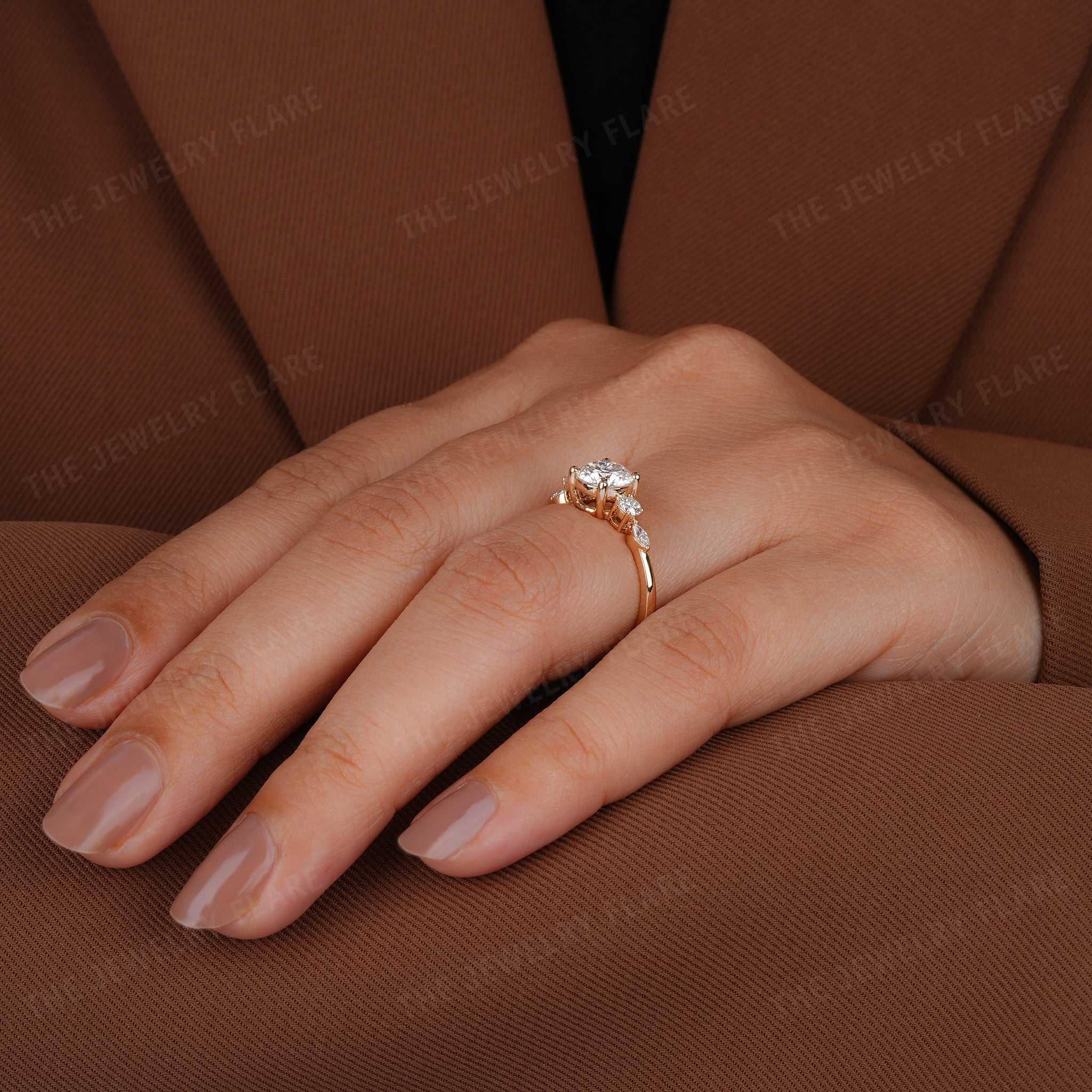 Round Solitaire Ring With Side Marquise Accent
