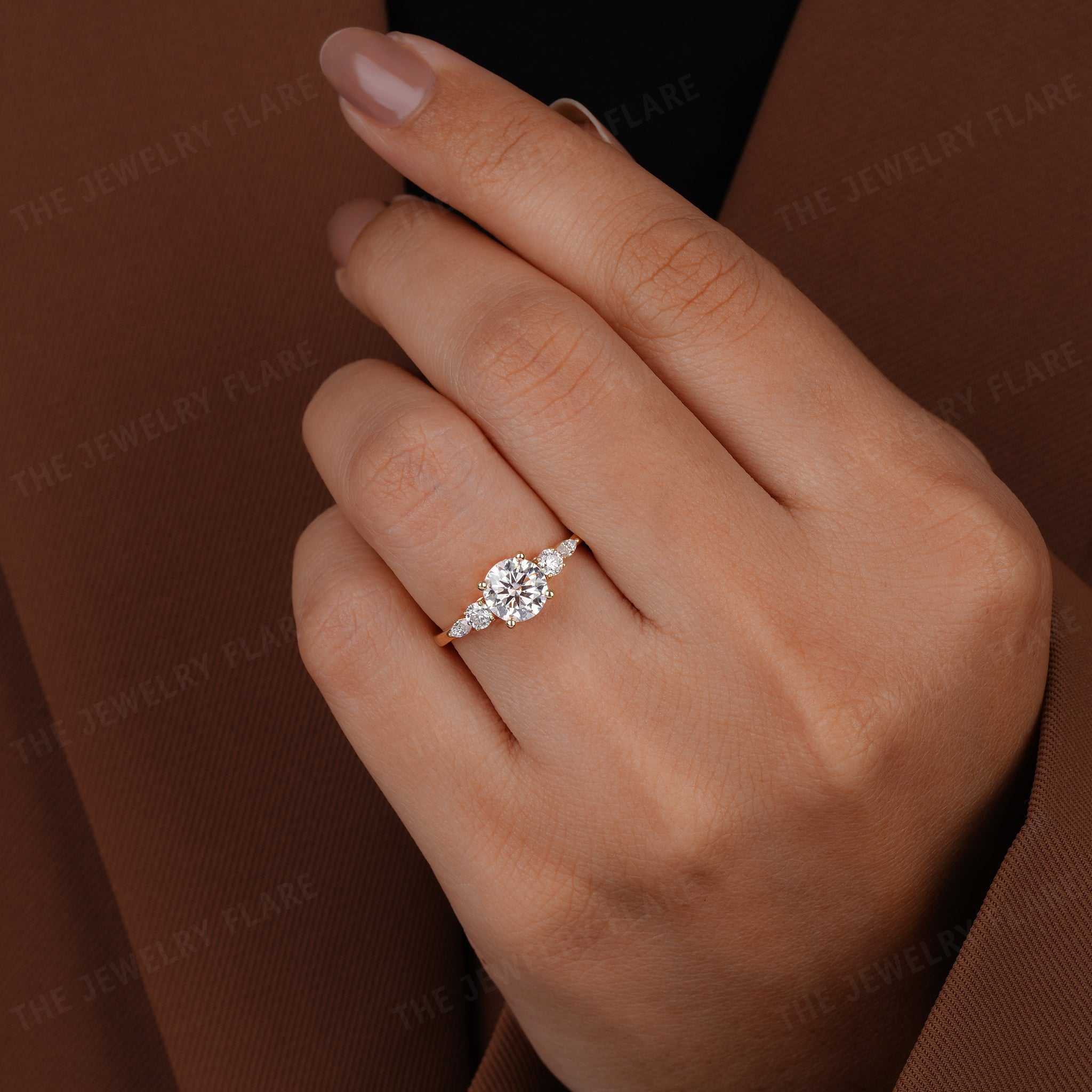 Round Solitaire Ring With Side Marquise Accent