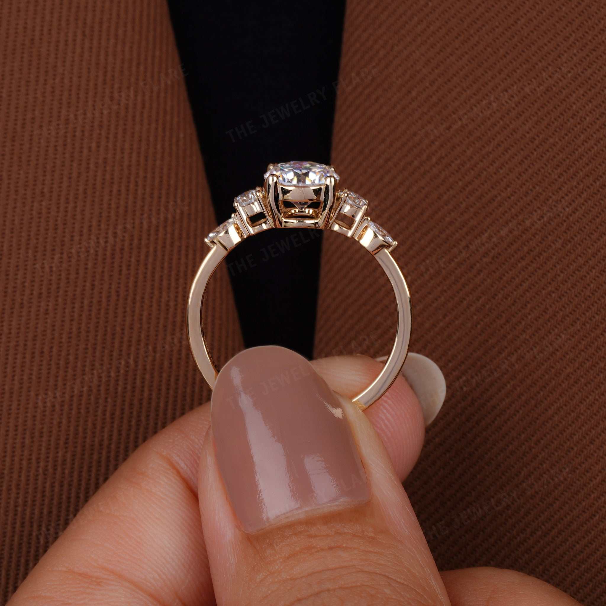Round Solitaire Ring With Side Marquise Accent