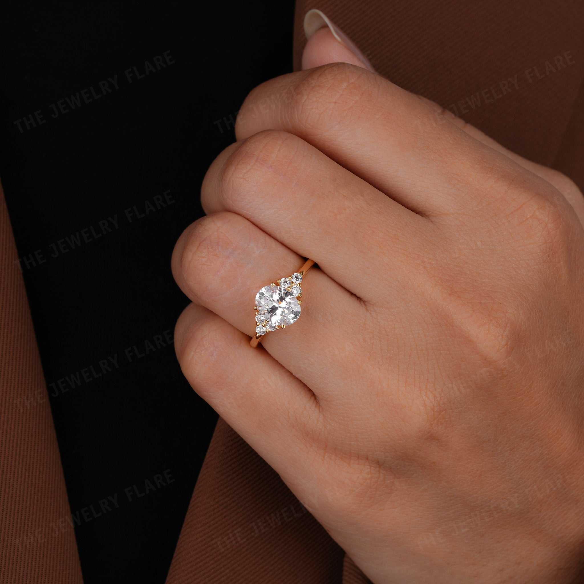 Oval Solitaire Ring With Side Round Diamond Ring