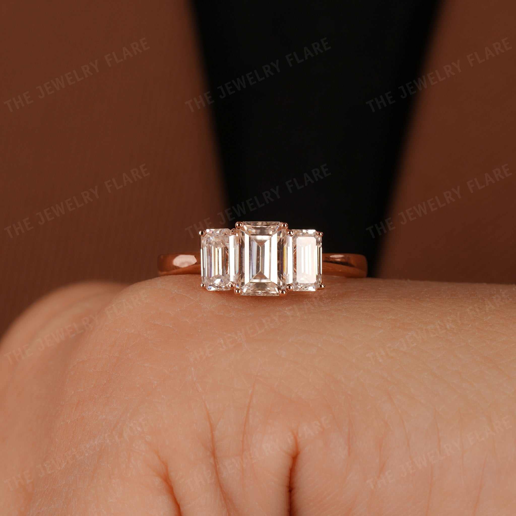 Three Stone Emerald Cut Ring